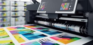 Modern printing press produces multi colored printouts accurately generated by artificial intelligence